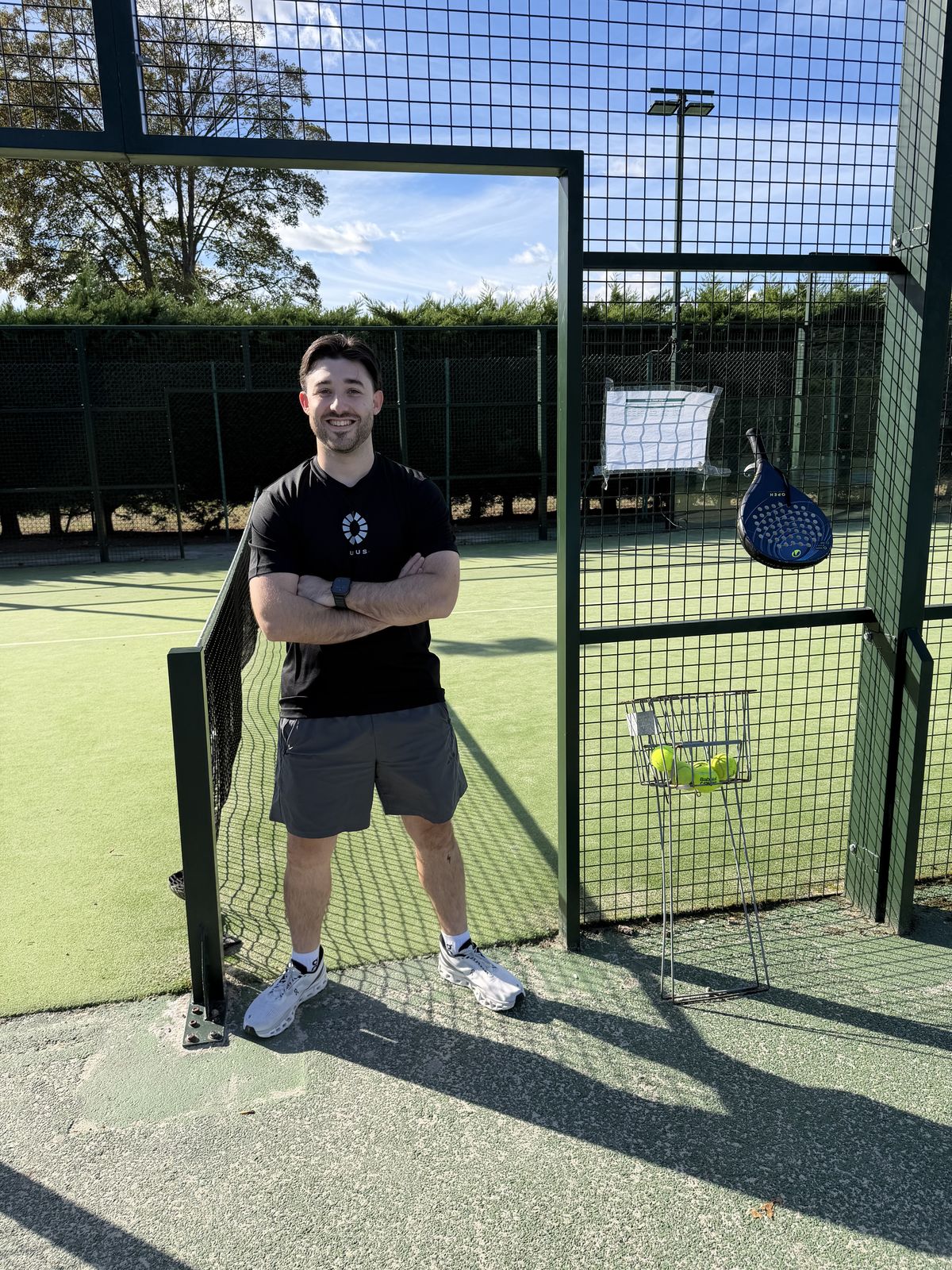 Oliver Bruton in the padel court at Down Hall